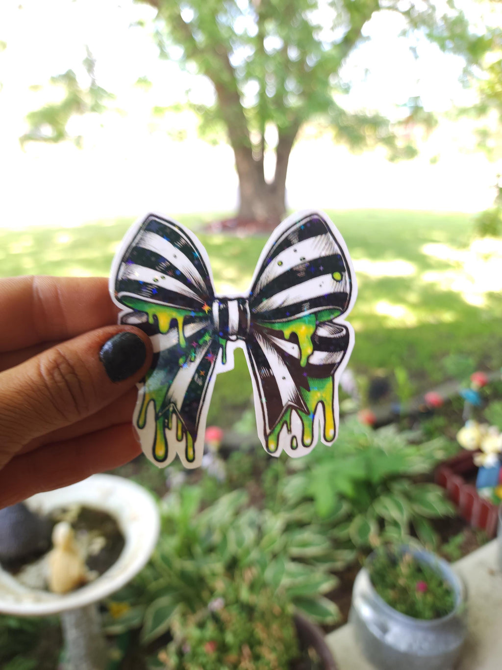 Gothic Bow Vinyl Sticker: Black & White Stripes with Neon Green Slime