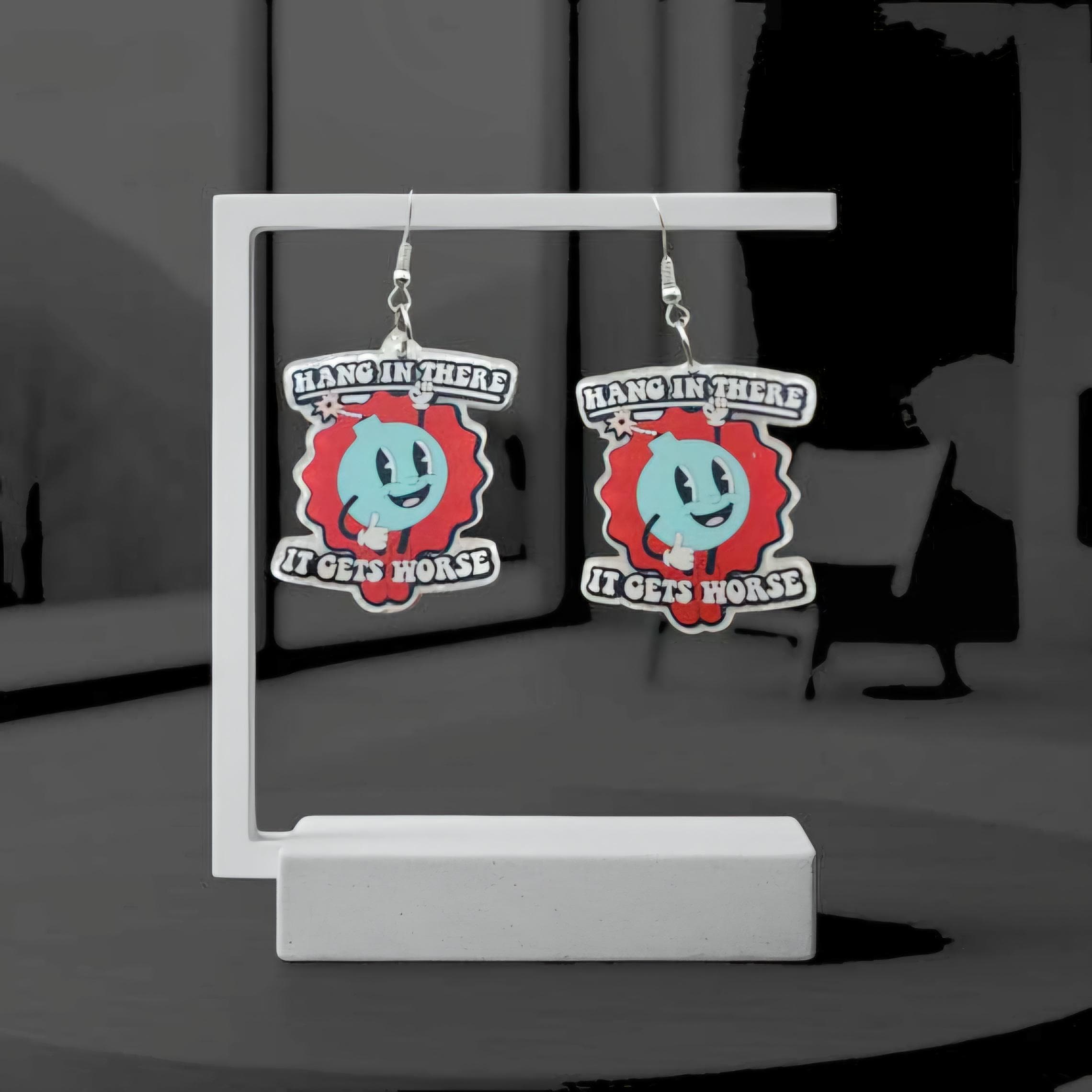 Sarcastic Bomb Dangle Earrings: Blue Acrylic with Bold White Lettering