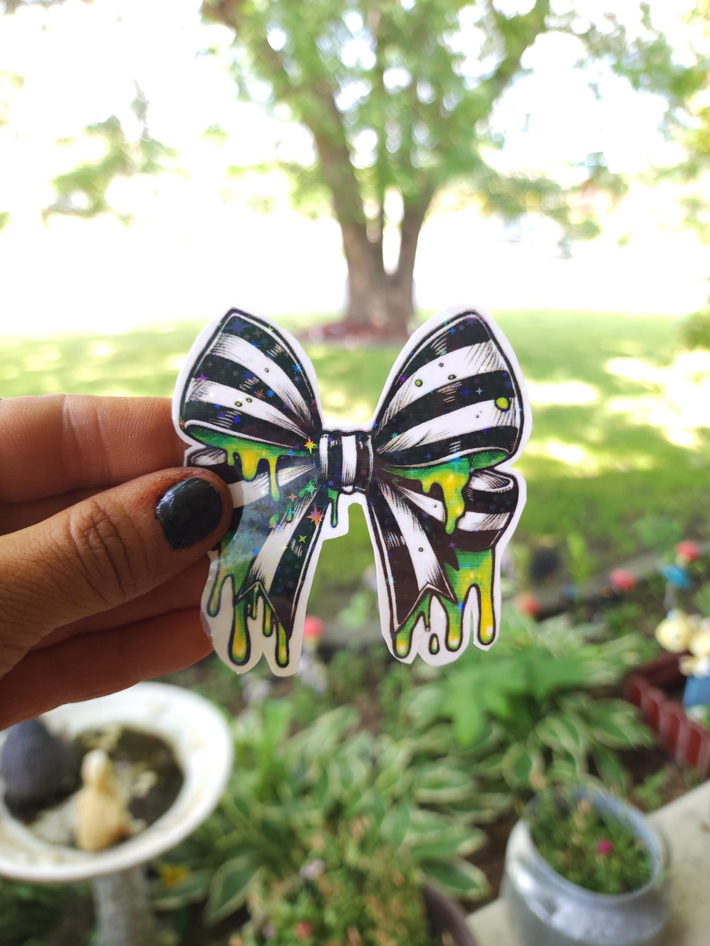 Gothic Bow Vinyl Sticker: Black & White Stripes with Neon Green Slime