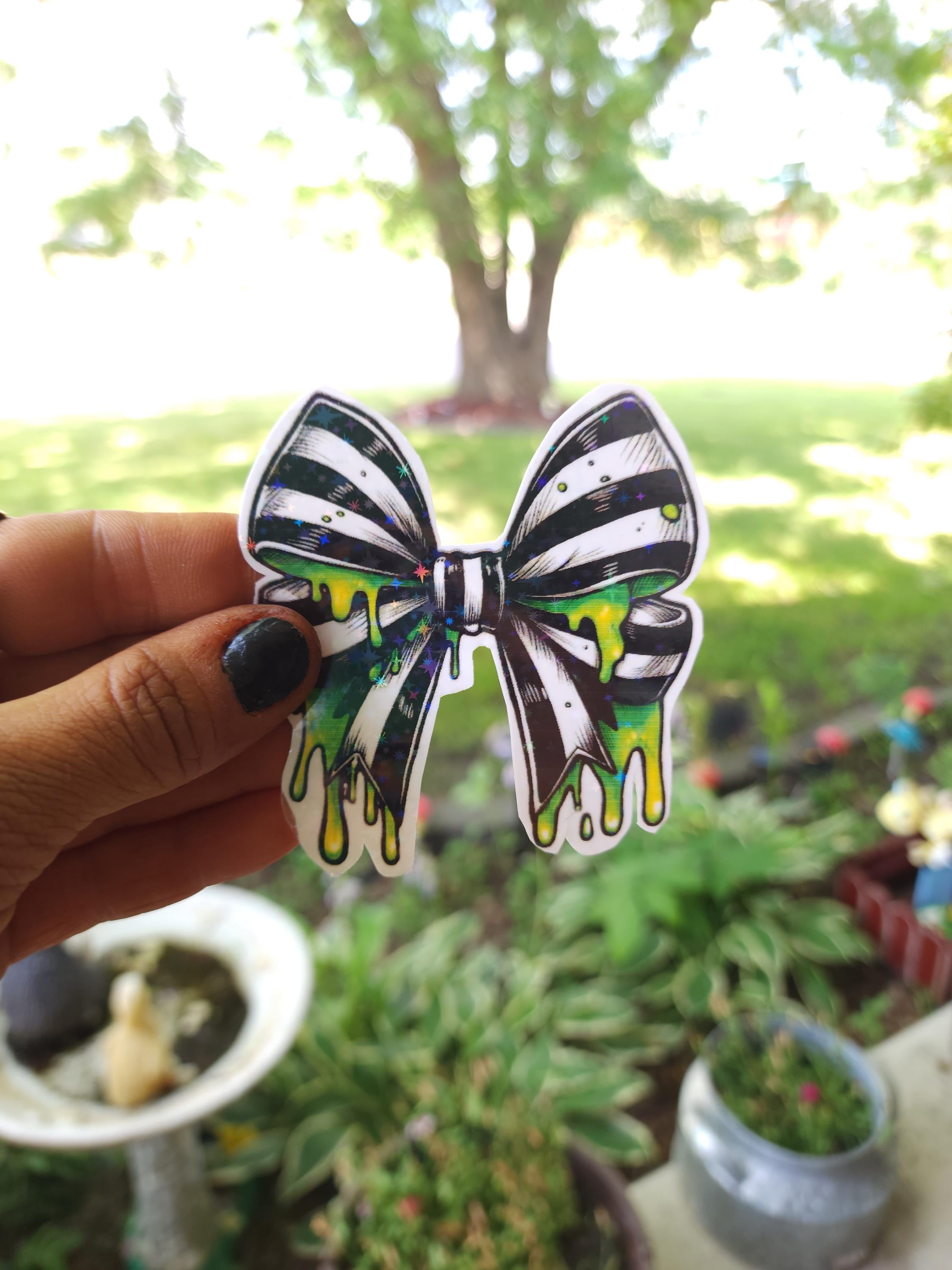 Gothic Bow Vinyl Sticker: Black & White Stripes with Neon Green Slime