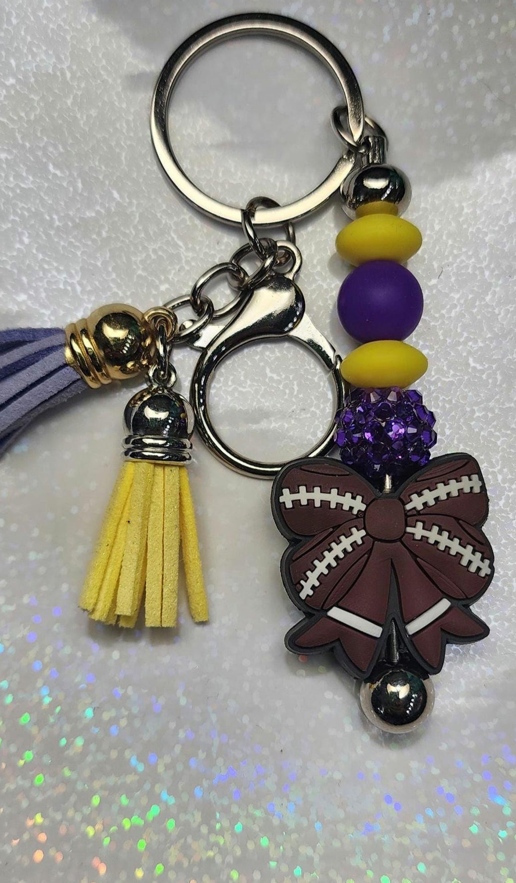 Purple and Gold Handmade Beaded Football Bow Keychain – Sports Bow Keychain, Game Day Team Spirit Accessory - Hempin Mayhem