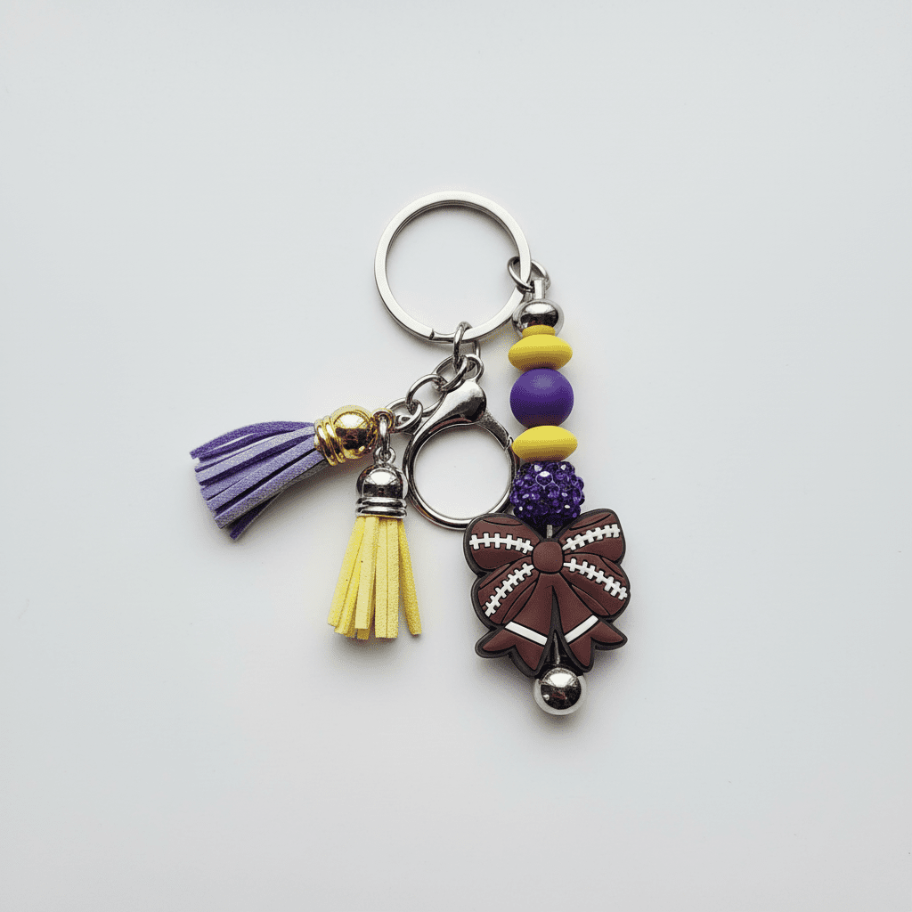 Purple and Gold Handmade Beaded Football Bow Keychain – Sports Bow Keychain, Game Day Team Spirit Accessory - Hempin Mayhem