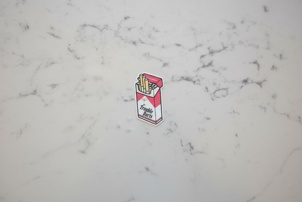 Trouble Darts Cigarette Pack Sticker | Red & White 2x2 Funny Sassy Vinyl Decal for Laptop, Water Bottle, or Toolbox